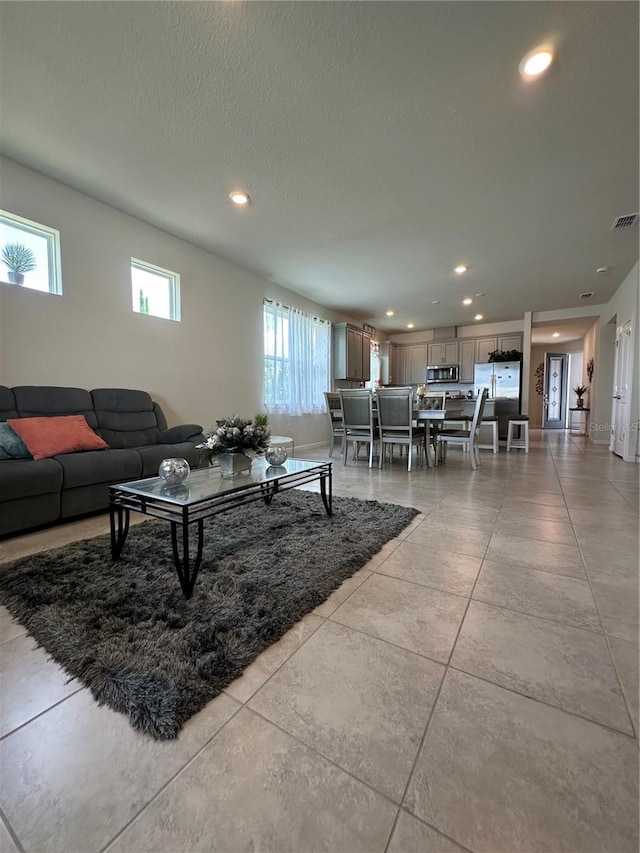 living room with light tile floors