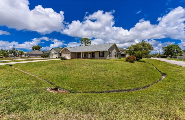 ranch-style house featuring a front yard