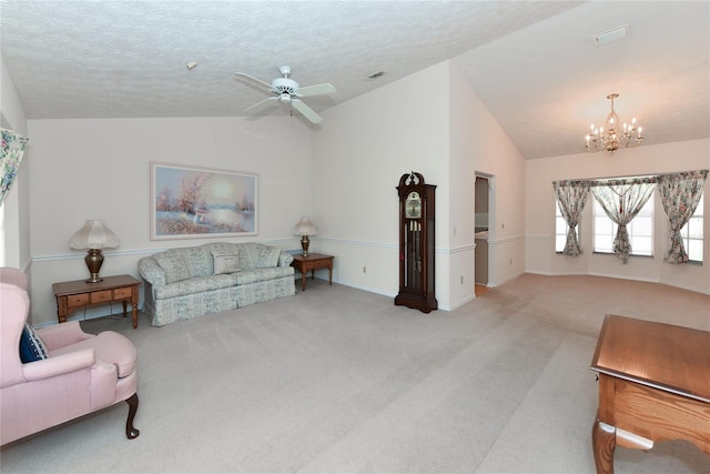 living room featuring carpet flooring, high vaulted ceiling, a textured ceiling, and ceiling fan with notable chandelier