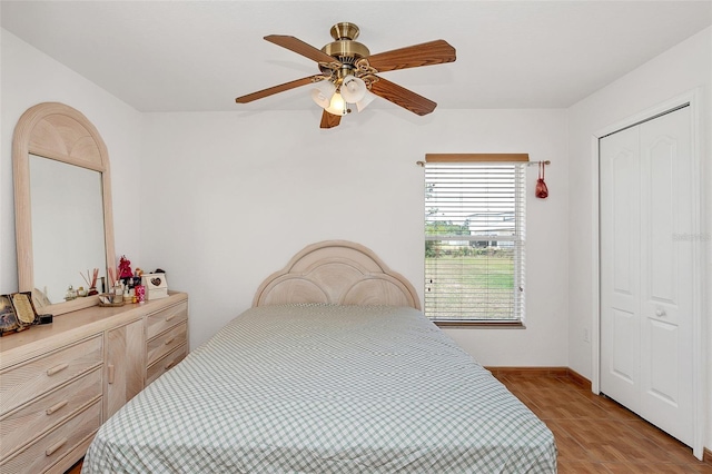 bedroom with a closet and ceiling fan