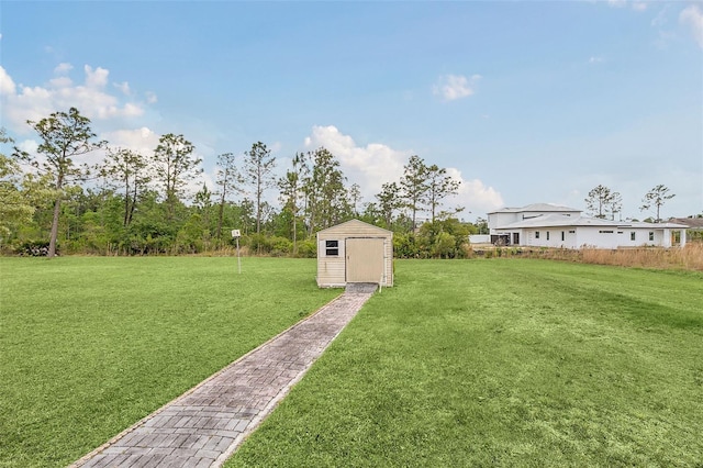 view of yard with a storage unit