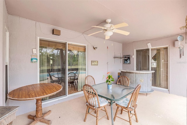 dining space featuring ceiling fan