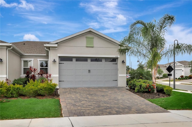 ranch-style home featuring a garage