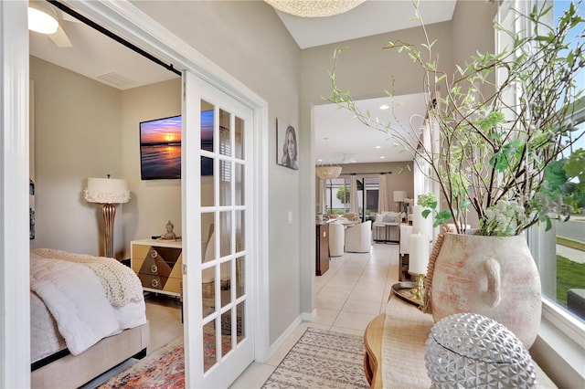 interior space with french doors and tile floors