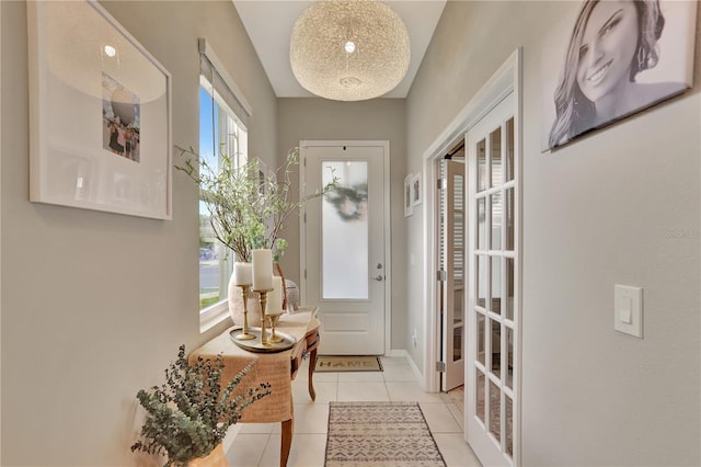 entrance foyer with light tile flooring