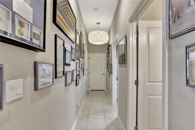 corridor featuring light tile flooring