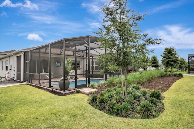 exterior space featuring a lawn and glass enclosure