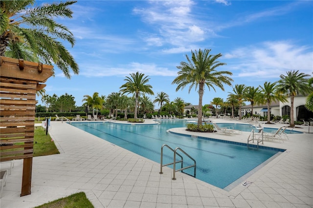 view of pool featuring a patio area