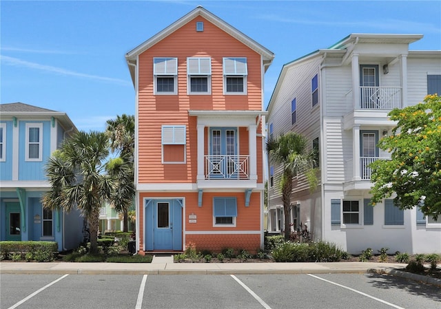 view of front of house with a balcony