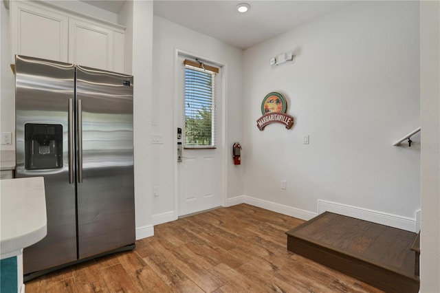 entryway featuring wood-type flooring