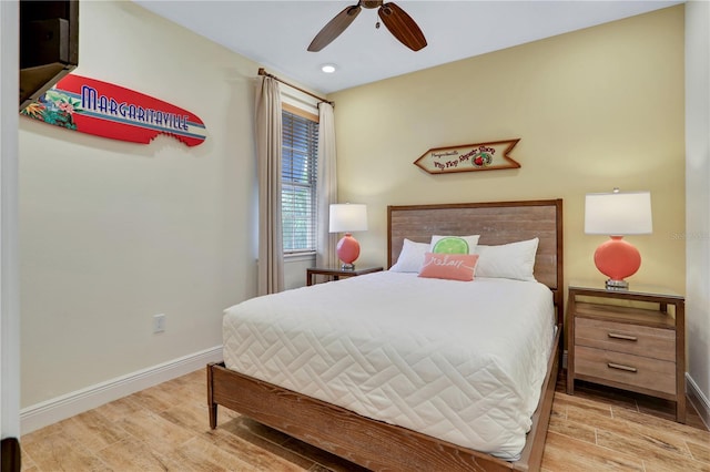 bedroom featuring ceiling fan and light hardwood / wood-style floors