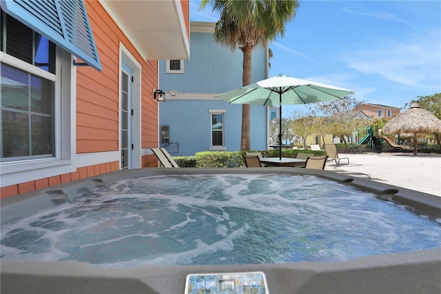 view of pool featuring a playground