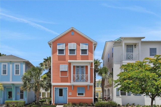 view of front of house with a balcony