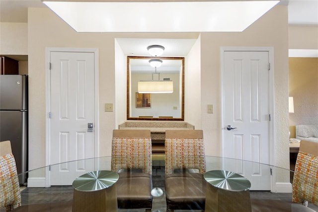 dining space featuring a skylight