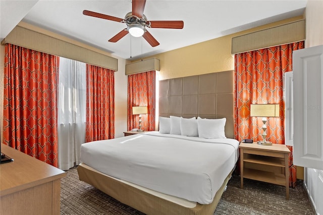 carpeted bedroom featuring ceiling fan