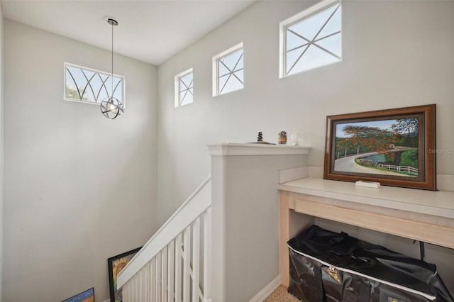 interior space with a wealth of natural light and carpet floors