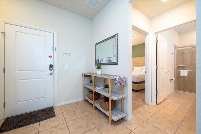 view of tiled foyer entrance