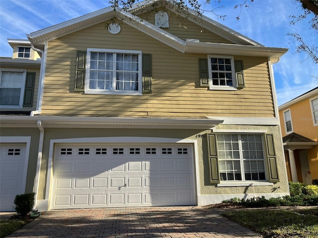 view of front of house with a garage