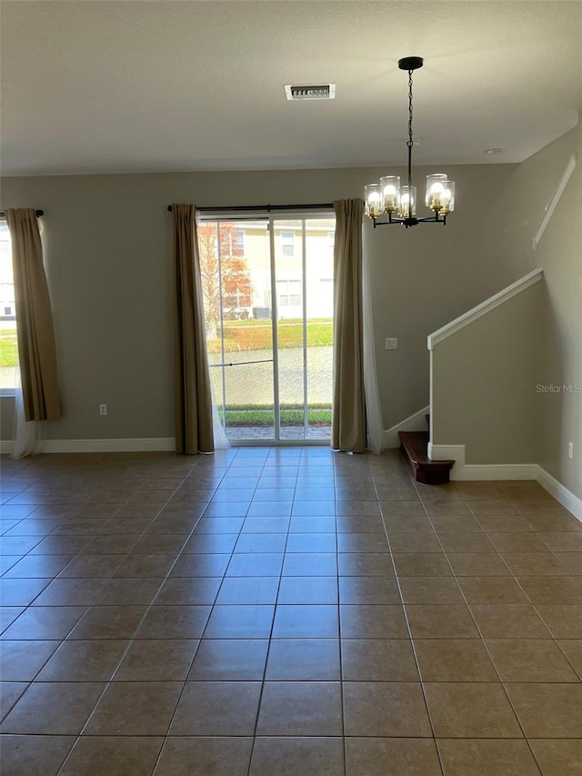 interior space featuring a chandelier