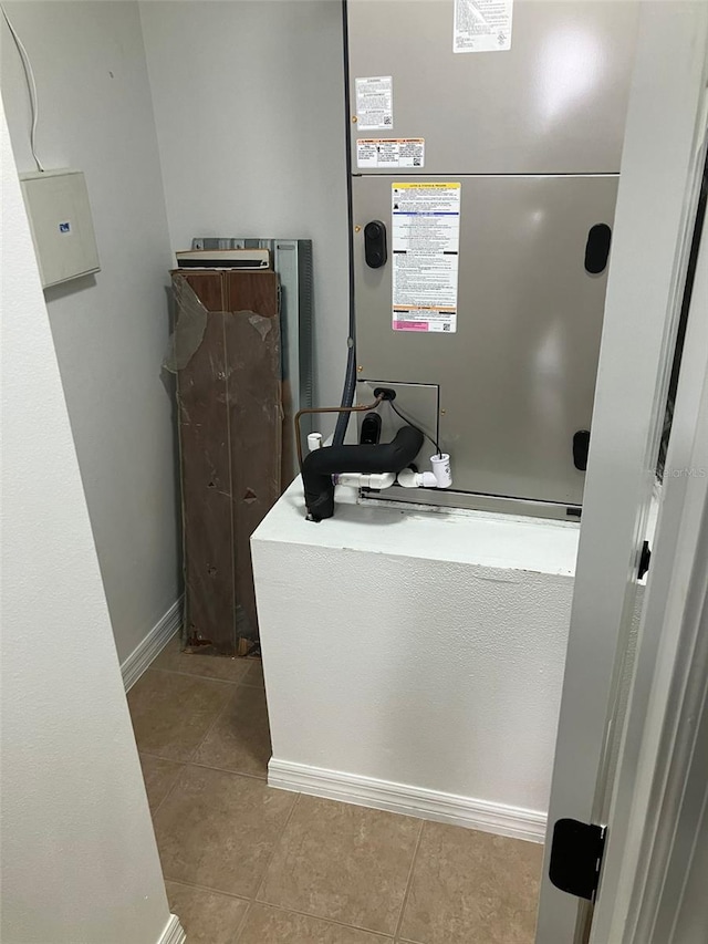 bathroom featuring tile floors