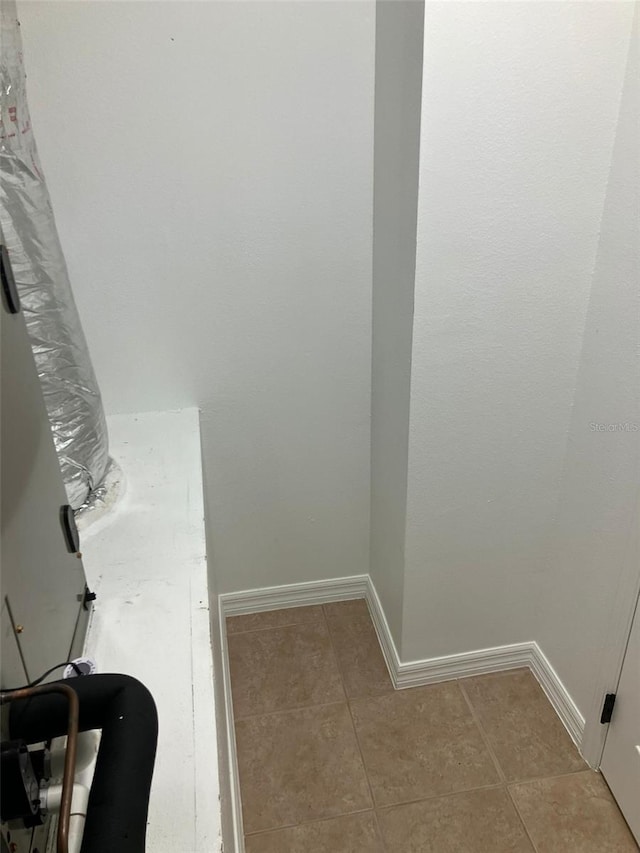 bathroom with tile flooring