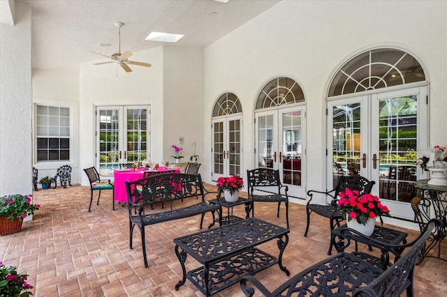 view of patio / terrace with french doors and ceiling fan