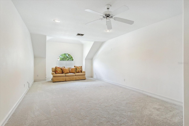 bonus room with lofted ceiling, light colored carpet, and ceiling fan