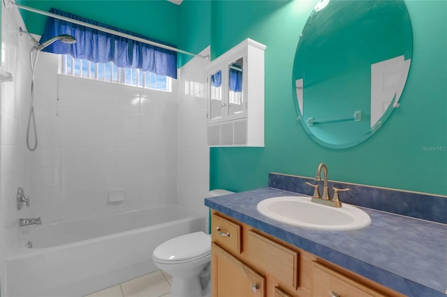 full bathroom with tile patterned flooring, vanity, toilet, and tiled shower / bath combo