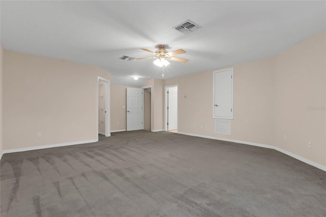 empty room with carpet and ceiling fan