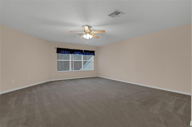 empty room with carpet floors and ceiling fan