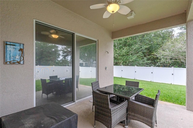 view of patio / terrace featuring ceiling fan