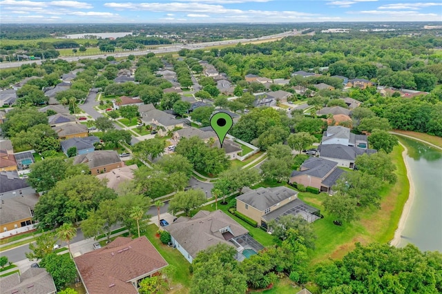 drone / aerial view featuring a water view