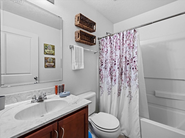 full bathroom featuring a textured ceiling, shower / tub combo with curtain, toilet, and vanity