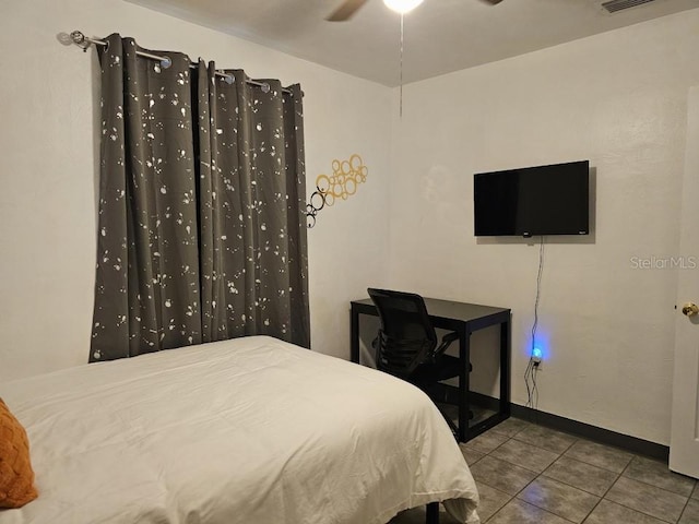 bedroom with tile flooring and ceiling fan