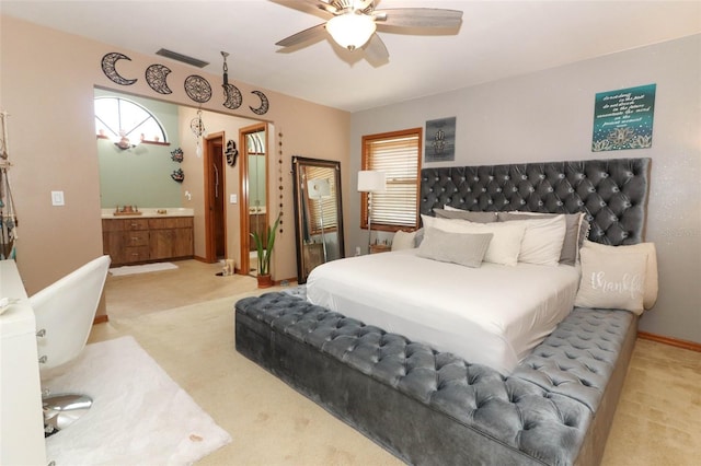 bedroom with ceiling fan and light colored carpet