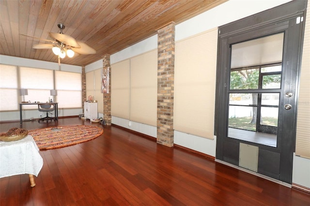 misc room featuring wooden ceiling, ceiling fan, and dark wood-type flooring