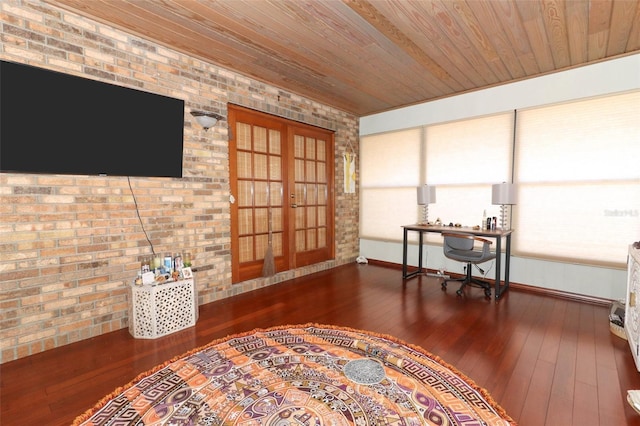 interior space with hardwood / wood-style floors, wood ceiling, french doors, and brick wall