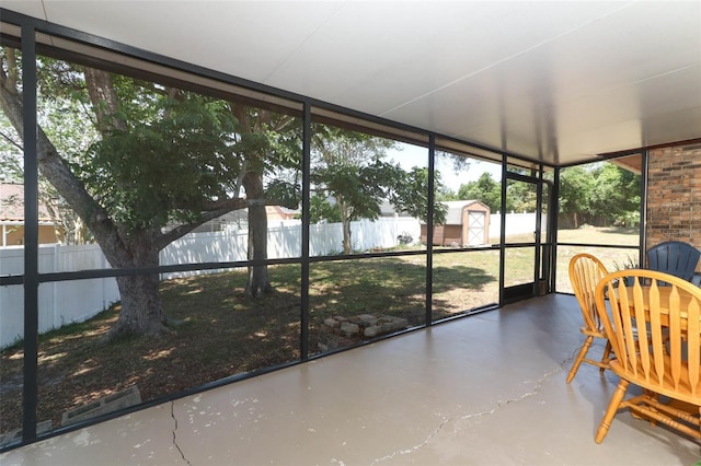 unfurnished sunroom featuring plenty of natural light