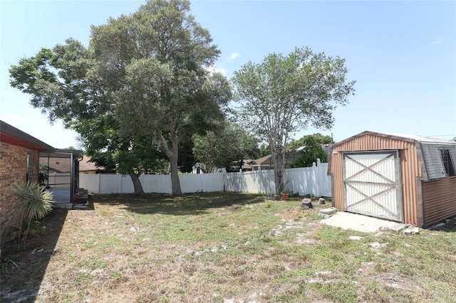 view of yard with a storage shed