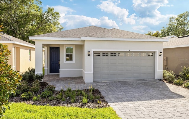 view of front of home with a garage