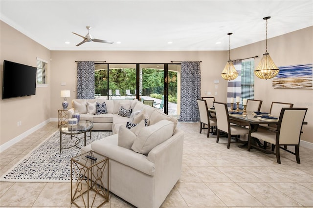 living room with ceiling fan and light tile floors