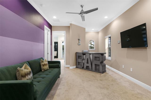 living room with crown molding, carpet, and ceiling fan