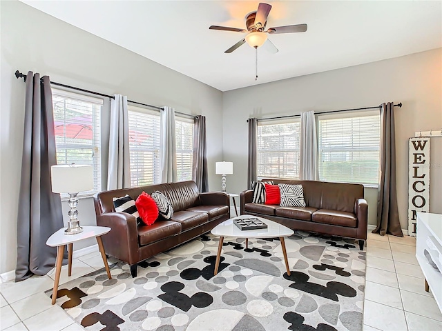 tiled living room with ceiling fan