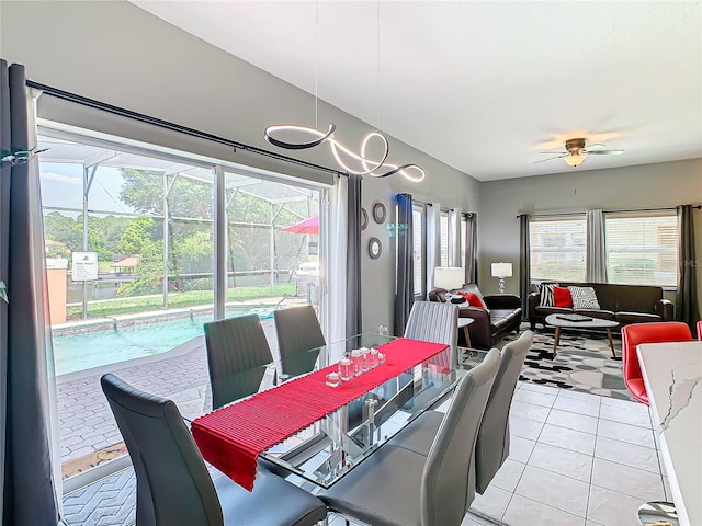 dining room with ceiling fan and light tile patterned floors