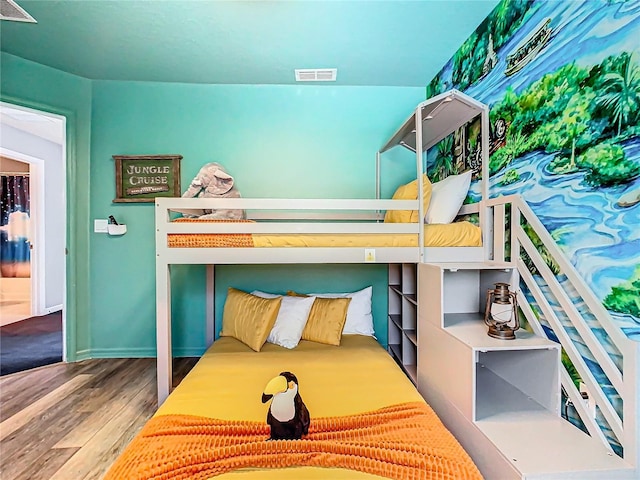 bedroom with wood-type flooring