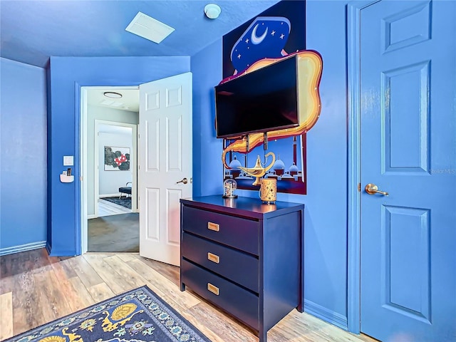 bedroom featuring light hardwood / wood-style floors