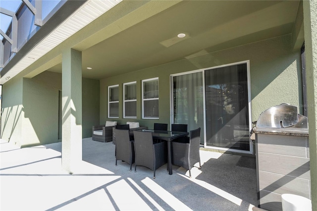 view of patio featuring an outdoor hangout area and exterior kitchen