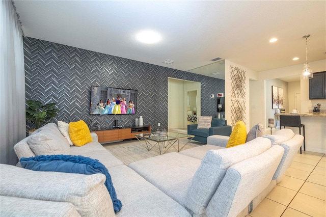 living room featuring light tile floors