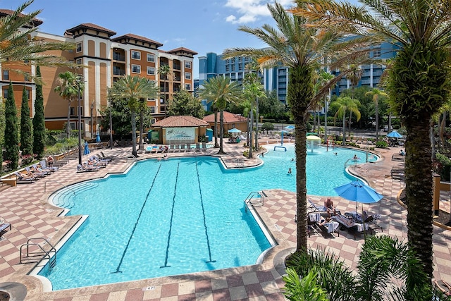 view of swimming pool featuring a patio