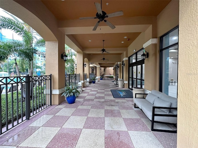 view of patio featuring ceiling fan